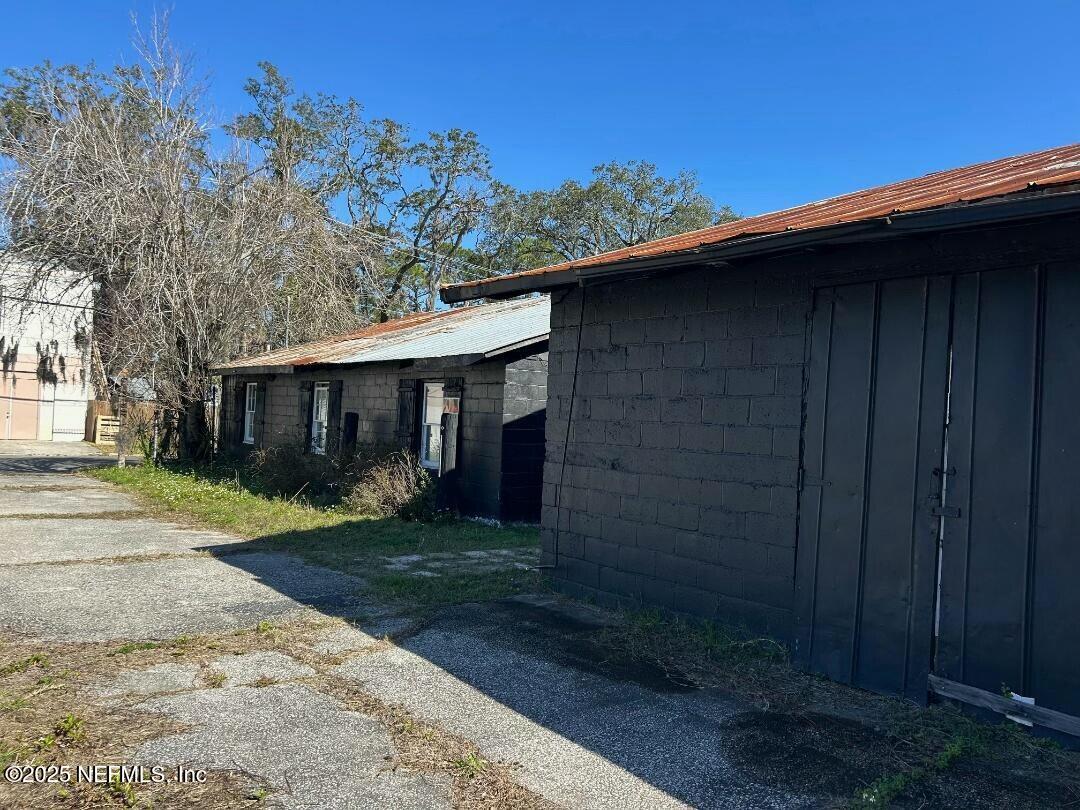 115 La Quinta Place St. Augustine, FL 32084 - Photo 10 of 32 a front view of a house with a garden