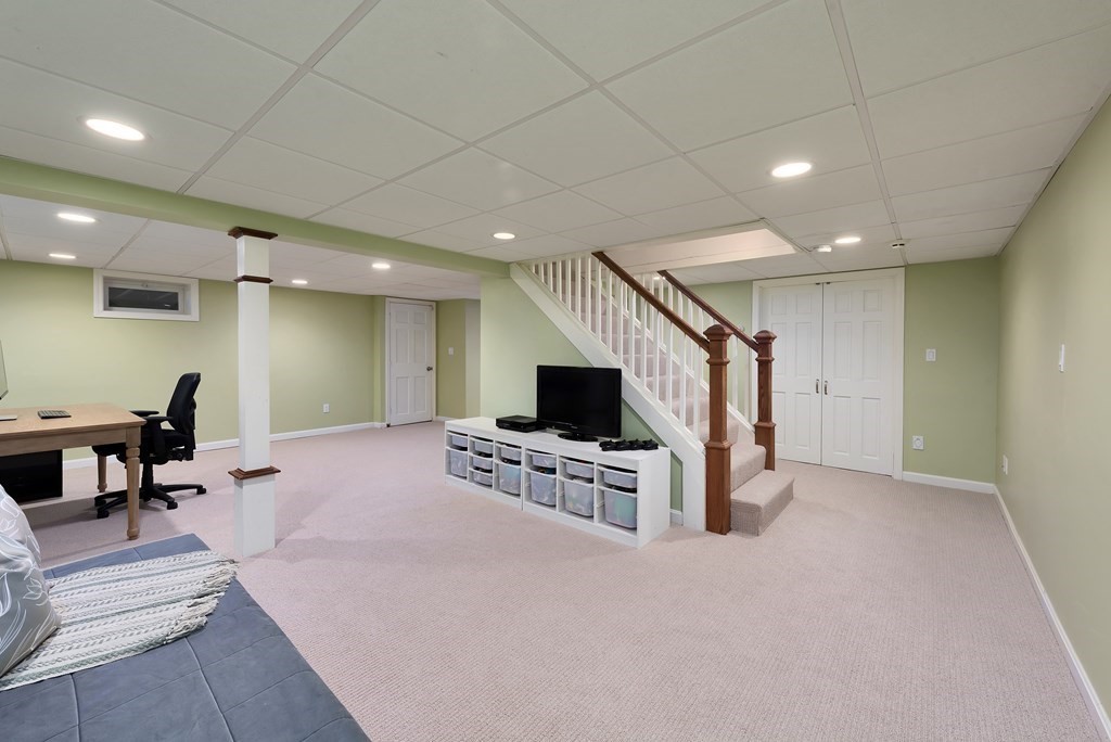 2 Pye Brook Lane Boxford, MA 01921 - Photo 15 of 30 a living room with furniture and a flat screen tv