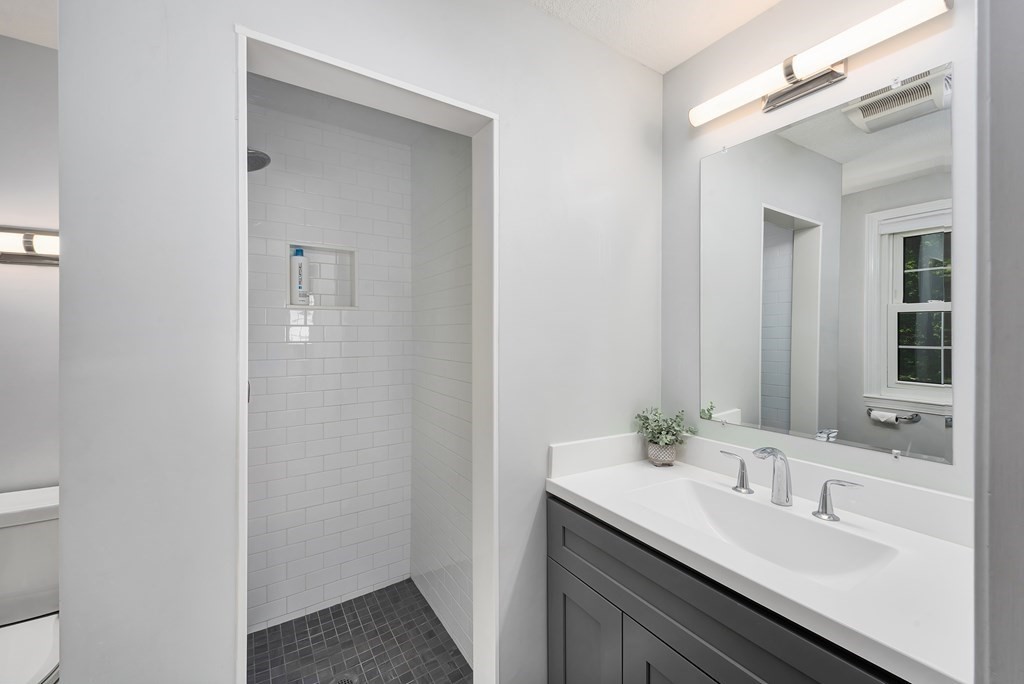 2 Pye Brook Lane Boxford, MA 01921 - Photo 19 of 30 a bathroom with a sink and a mirror