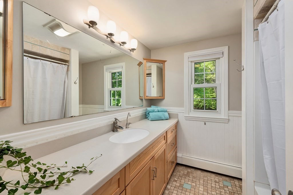 2 Pye Brook Lane Boxford, MA 01921 - Photo 20 of 30 a bathroom with a sink and a mirror