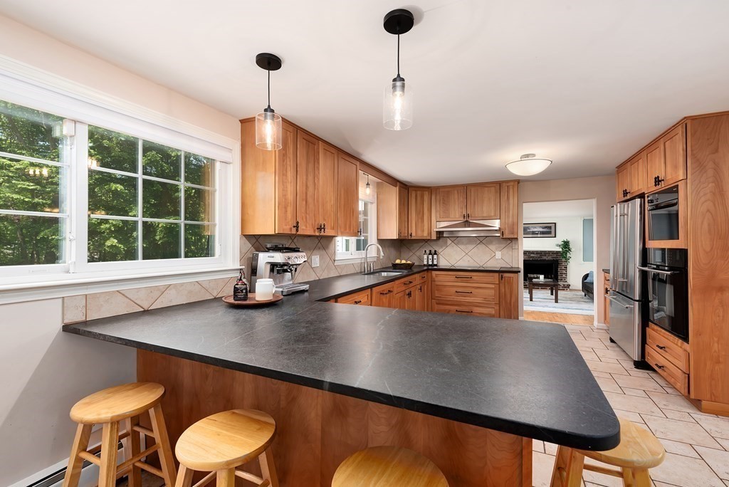 2 Pye Brook Lane Boxford, MA 01921 - Photo 2 of 30 a kitchen with stainless steel appliances granite countertop a sink window and cabinets