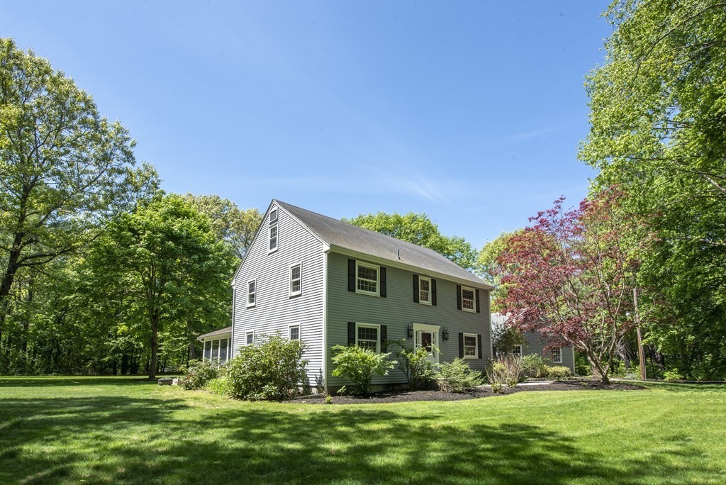 2 Pye Brook Lane Boxford, MA 01921 - Photo 26 of 30 a front view of house with yard and green space