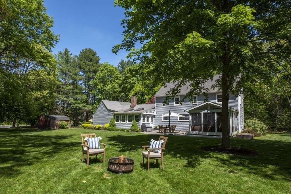 2 Pye Brook Lane Boxford, MA 01921 - Photo 28 of 30 a view of a house with backyard sitting area and garden