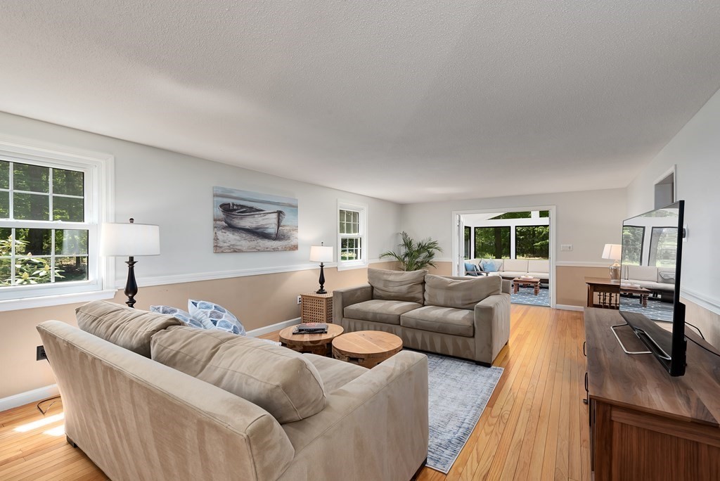 2 Pye Brook Lane Boxford, MA 01921 - Photo 8 of 30 a living room with furniture and a table
