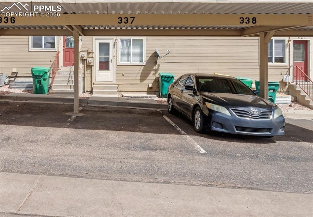 2579 Malpaso Point Colorado Springs, CO 80922 - Photo 14 of 15 a car parked in front of a house