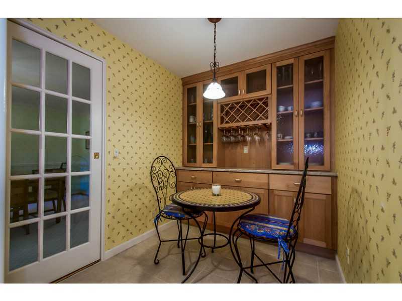 630 Steamboat Road, Unit 1A Greenwich, CT 06830 - Photo 11 of 24 a view of a chairs and table in the house