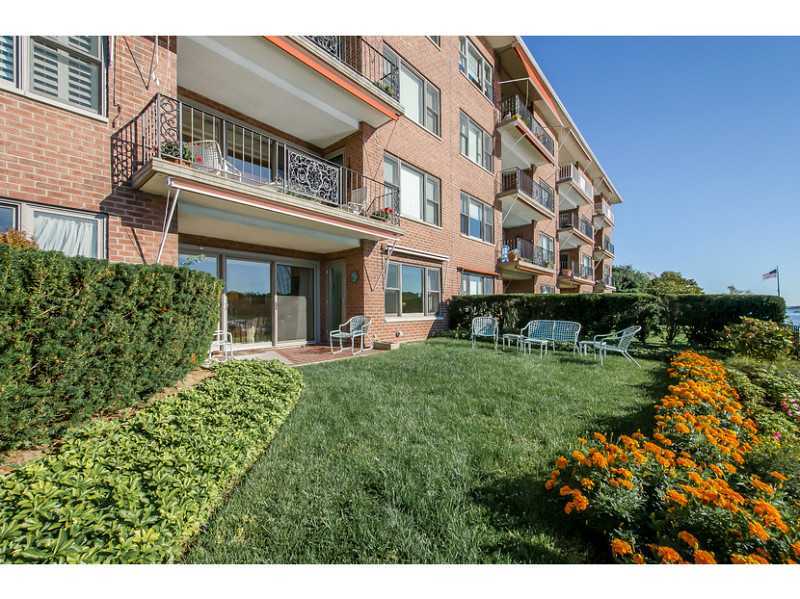 630 Steamboat Road, Unit 1A Greenwich, CT 06830 - Photo 2 of 24 a view of a building with garden