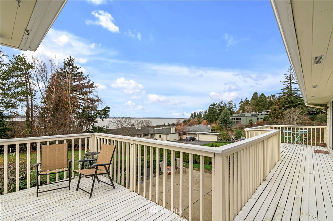 426 Bayside Road Bellingham, WA 98225 - Photo 11 of 40 a view of a balcony with wooden floor and fence