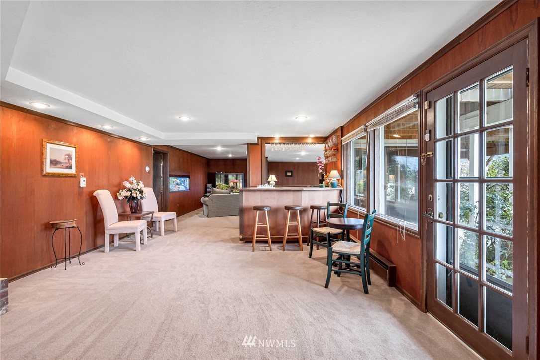 426 Bayside Road Bellingham, WA 98225 - Photo 27 of 40 a living room with furniture and a large window