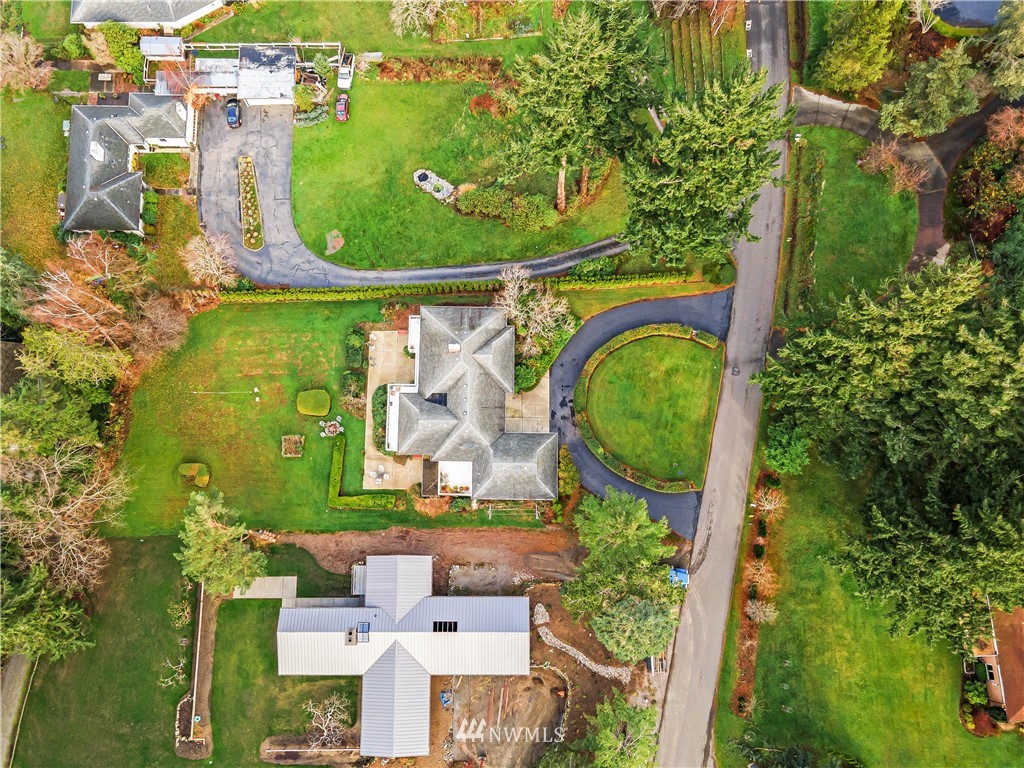 426 Bayside Road Bellingham, WA 98225 - Photo 3 of 40 an aerial view of a residential houses with outdoor space and swimming pool
