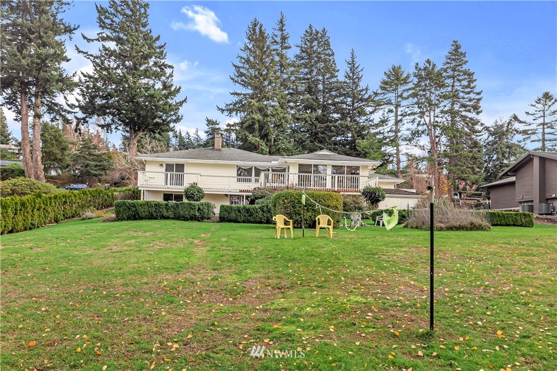 426 Bayside Road Bellingham, WA 98225 - Photo 39 of 40 a view of a house with a yard and sitting area