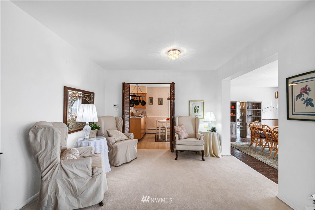 426 Bayside Road Bellingham, WA 98225 - Photo 8 of 40 a living room with furniture and a flat screen tv