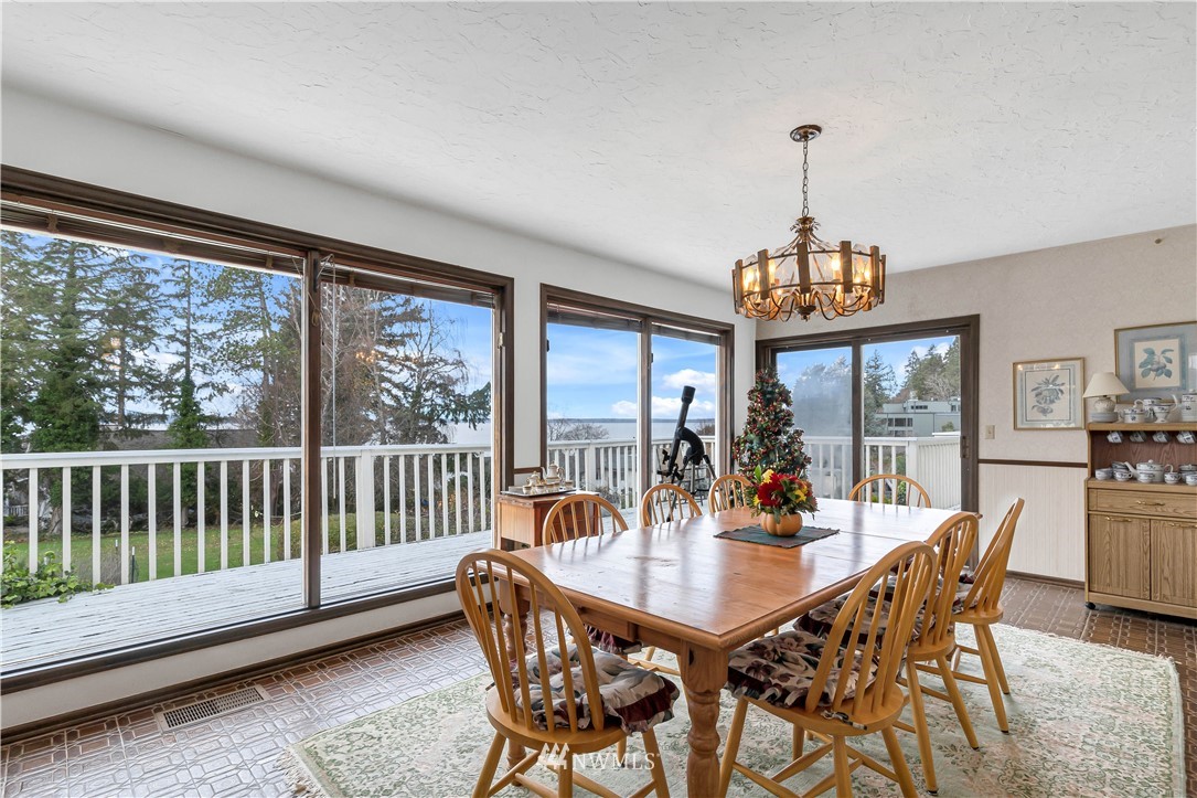 426 Bayside Road Bellingham, WA 98225 - Photo 9 of 40 a view of a dining room with furniture window and outside view