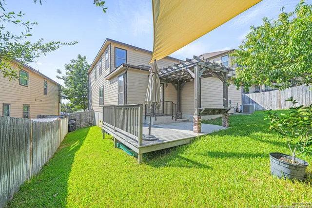 a view of a backyard with a garden