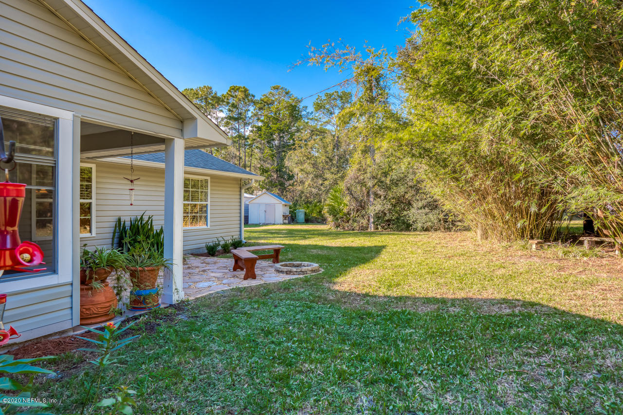 7020 Catlett Road St. Augustine, FL 32095 - Photo 38 of 50 a view of yard with swimming pool and furniture