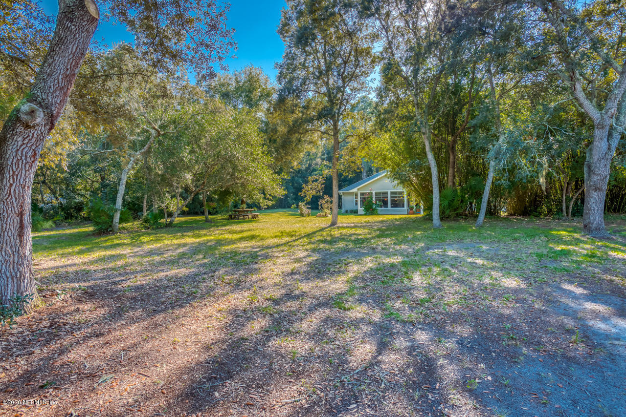 7020 Catlett Road St. Augustine, FL 32095 - Photo 40 of 50 a view of a house with a yard