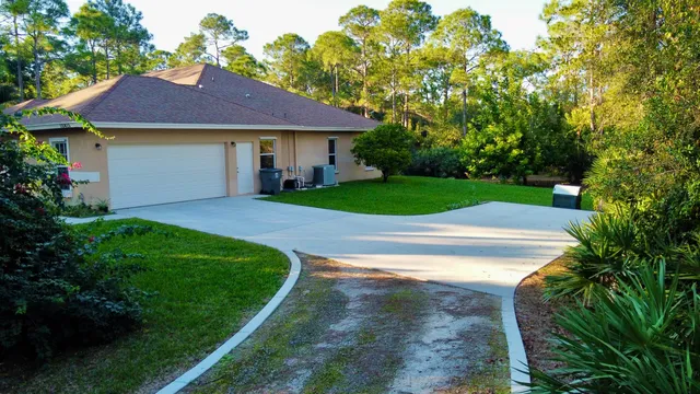 $890,000 | 10415 150th Court North, Jupiter, FL 33478