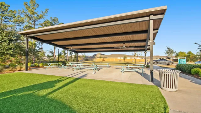 a view of a swimming pool with a yard