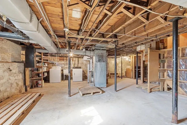 a view of a room with wooden walls