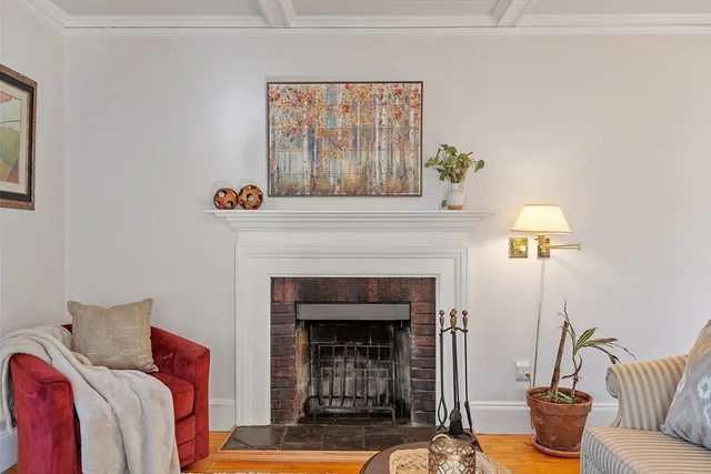 a living room with a couch and a fireplace