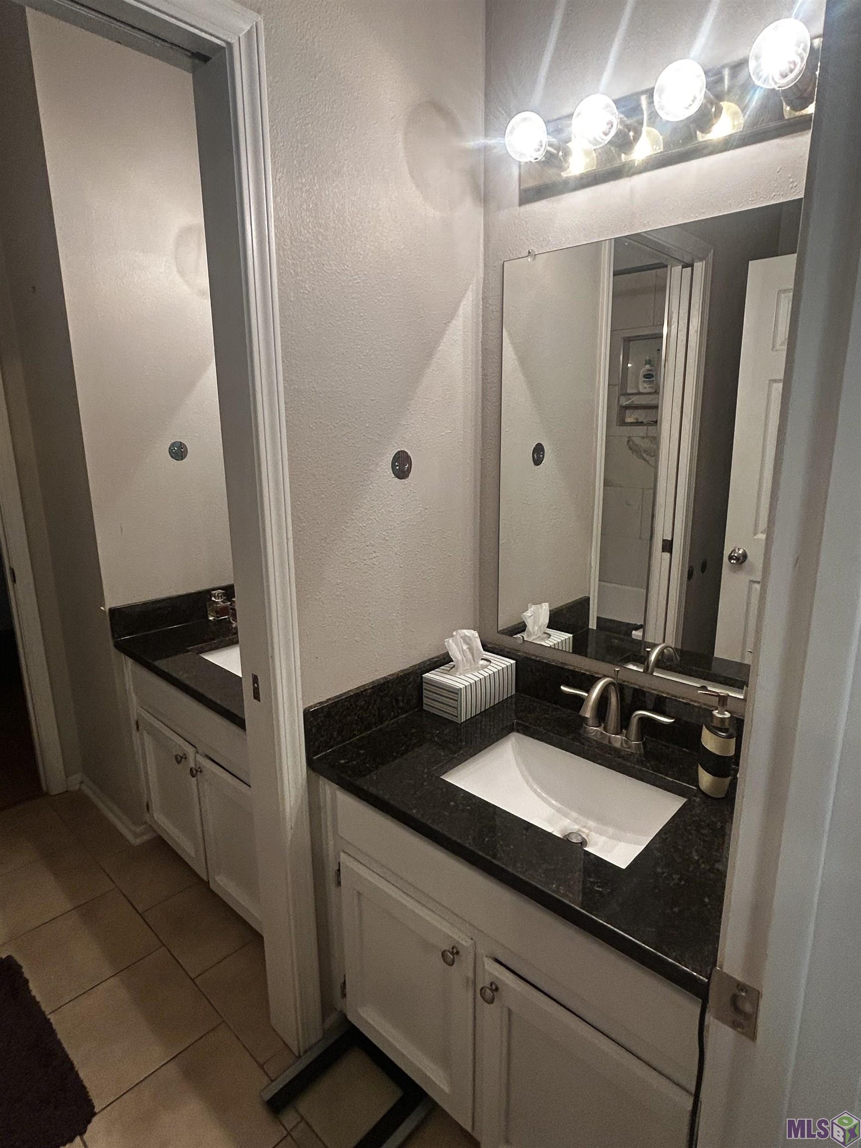 10926 Old Hammond Highway, Unit 20 Baton Rouge, LA 70816 - Photo 14 of 21 Jack & Jill Bathroom Upstairs