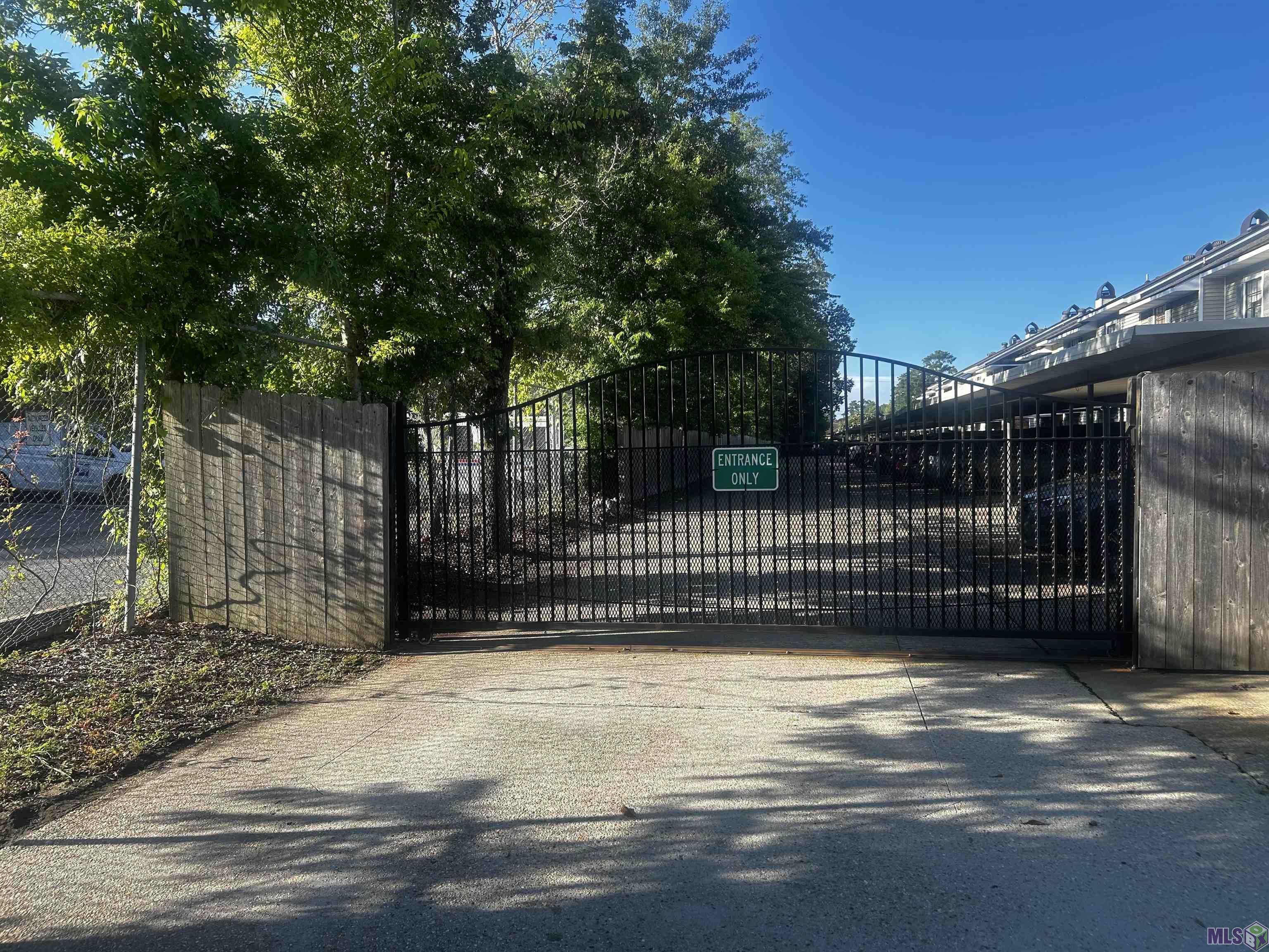 10926 Old Hammond Highway, Unit 20 Baton Rouge, LA 70816 - Photo 20 of 21 Secure Gate Entrance