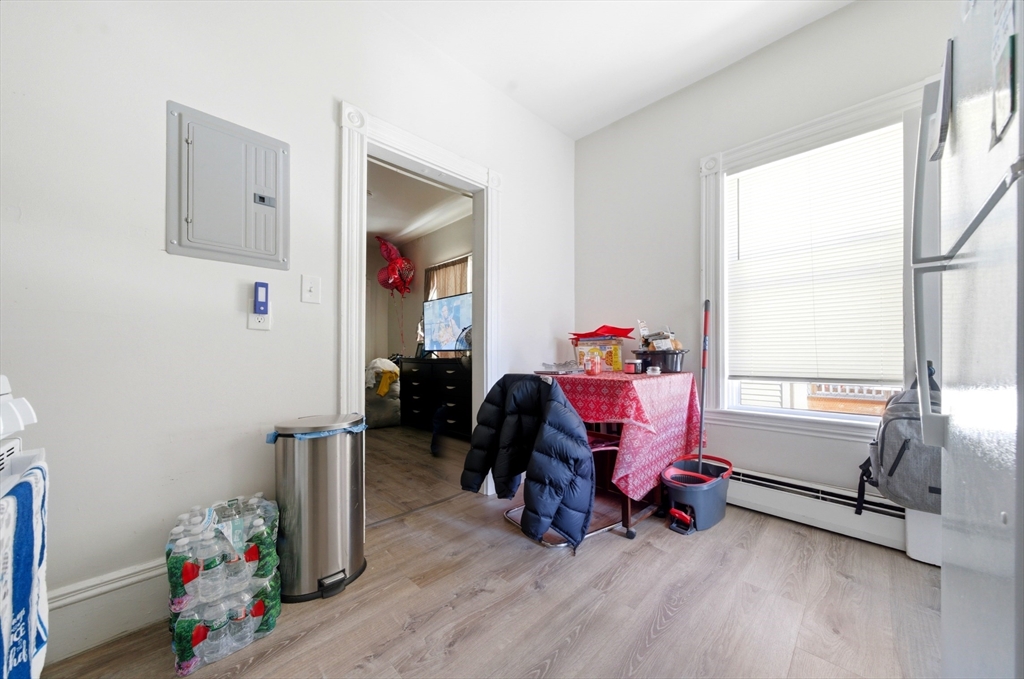 14-16 Ripley Street Malden, MA 02148 - Photo 34 of 37 a living room with furniture and a wooden floor