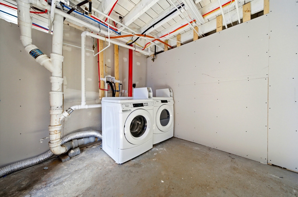 14-16 Ripley Street Malden, MA 02148 - Photo 35 of 37 a utility room with dryer and washer