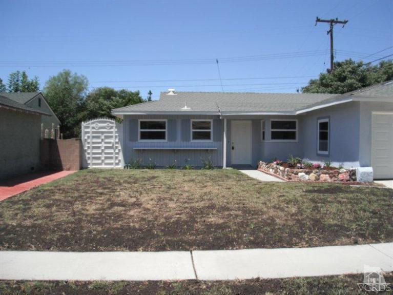 2117 Magnolia Street Simi Valley, CA 93065 - Photo 16 of 16 a view of a house with a yard