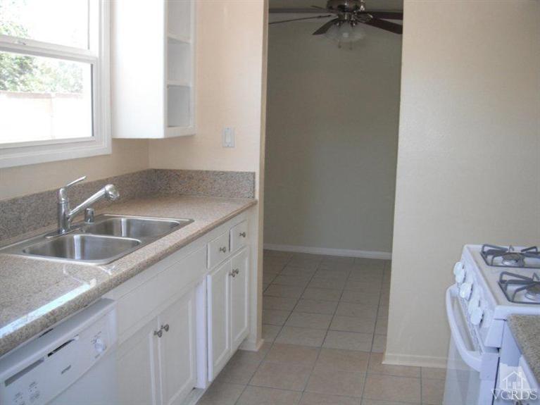 2117 Magnolia Street Simi Valley, CA 93065 - Photo 5 of 16 a kitchen with a sink and a window