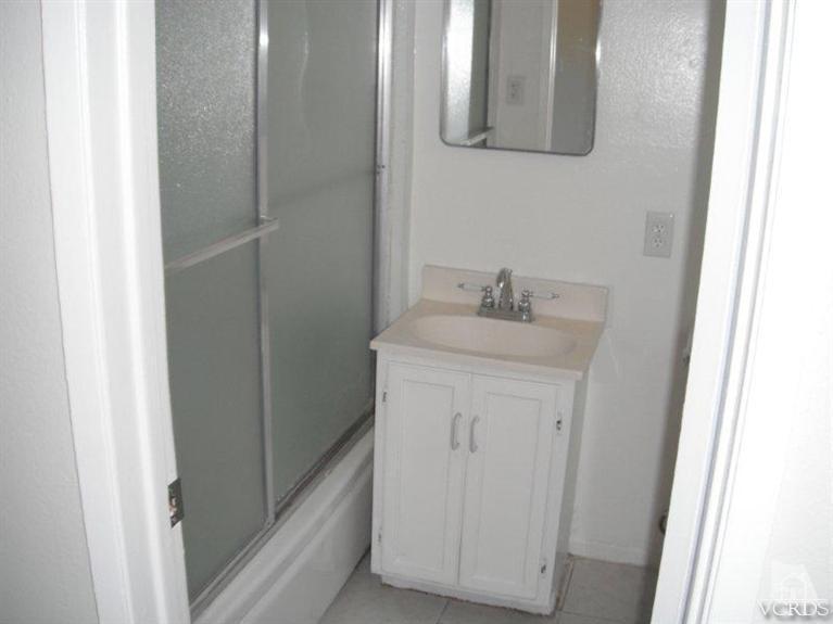 2117 Magnolia Street Simi Valley, CA 93065 - Photo 9 of 16 a bathroom with a sink and a mirror
