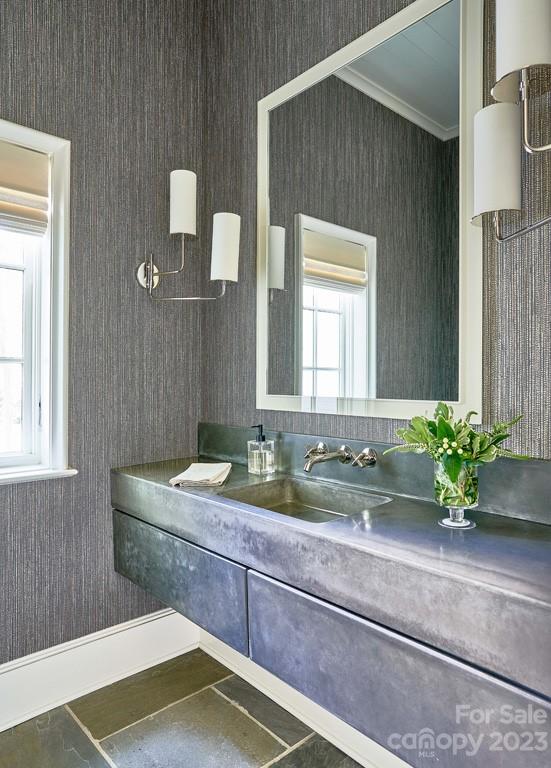 2527 Lemon Tree Lane Charlotte, NC 28211 - Photo 14 of 40 a bathroom with a granite countertop sink a mirror and a shower