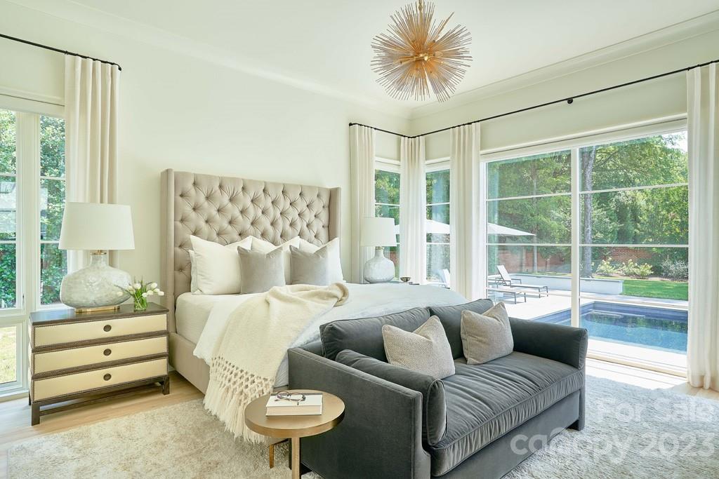2527 Lemon Tree Lane Charlotte, NC 28211 - Photo 22 of 40 a living room with furniture and a large window