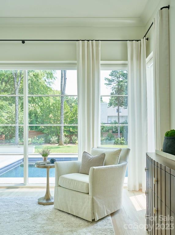 2527 Lemon Tree Lane Charlotte, NC 28211 - Photo 23 of 40 a living room with furniture and a large window