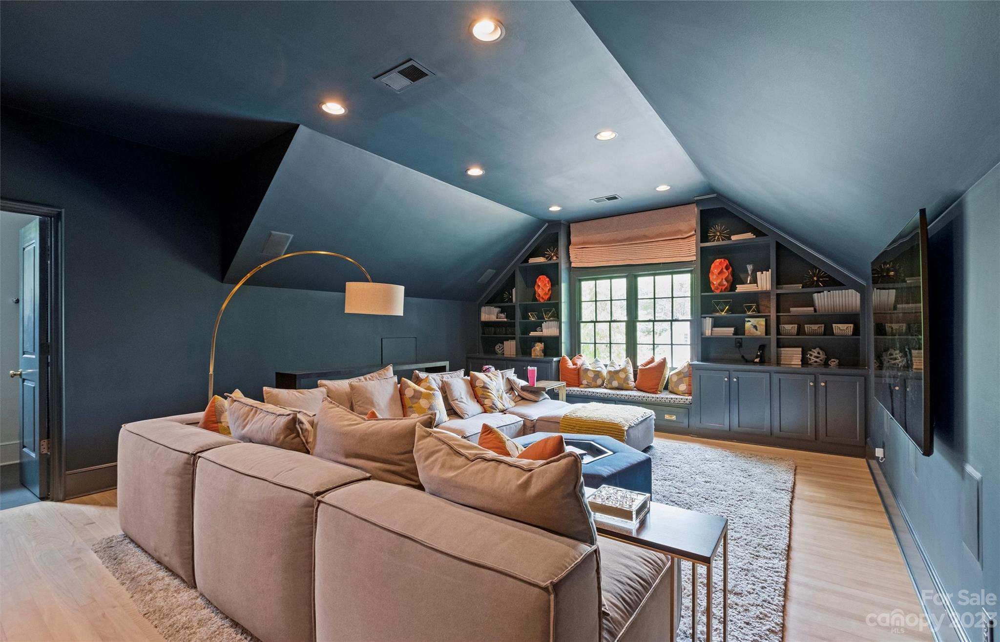 2527 Lemon Tree Lane Charlotte, NC 28211 - Photo 26 of 40 a living room with furniture and a flat screen tv