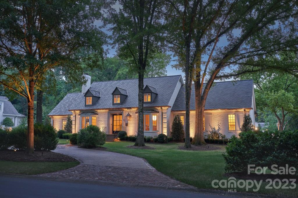 2527 Lemon Tree Lane Charlotte, NC 28211 - Photo 35 of 40 a front view of a house with a garden