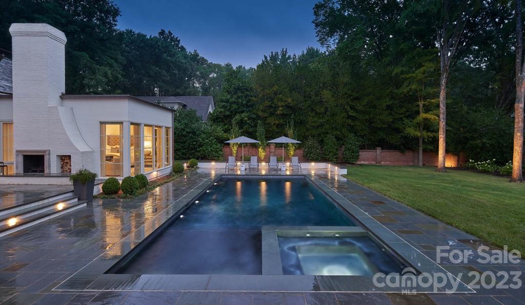 2527 Lemon Tree Lane Charlotte, NC 28211 - Photo 40 of 40 a view of a chairs and table on the wooden deck