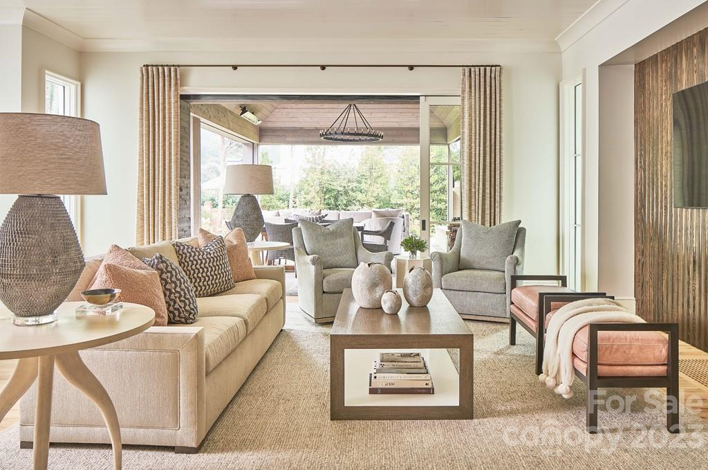 2527 Lemon Tree Lane Charlotte, NC 28211 - Photo 9 of 40 a living room with furniture and a large window