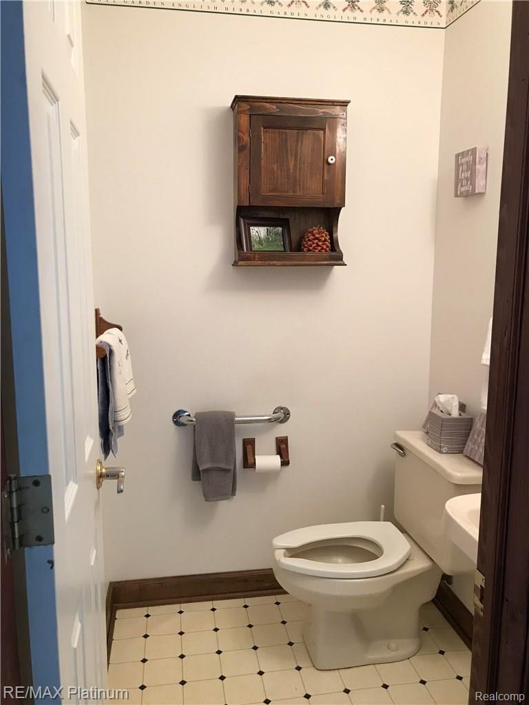 11365 Gage Road Holly, MI 48442 - Photo 42 of 42 half bath.jpg