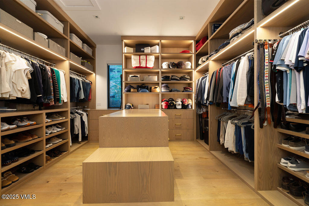 254 Beaver Dam Road Vail, CO 81657 - Photo 25 of 46 a view of walk in closet with clothes and shoes