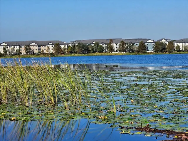 a view of a lake with houses