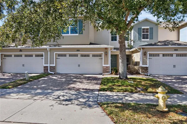 an aerial view of a swimming pool and outdoor space