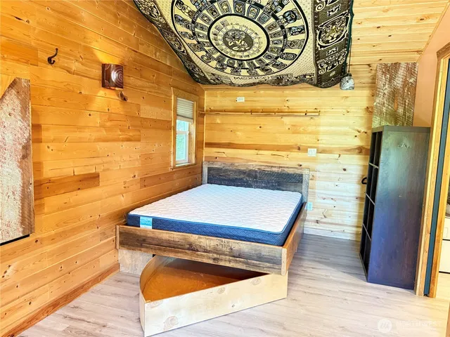 a kitchen with a refrigerator and a stove