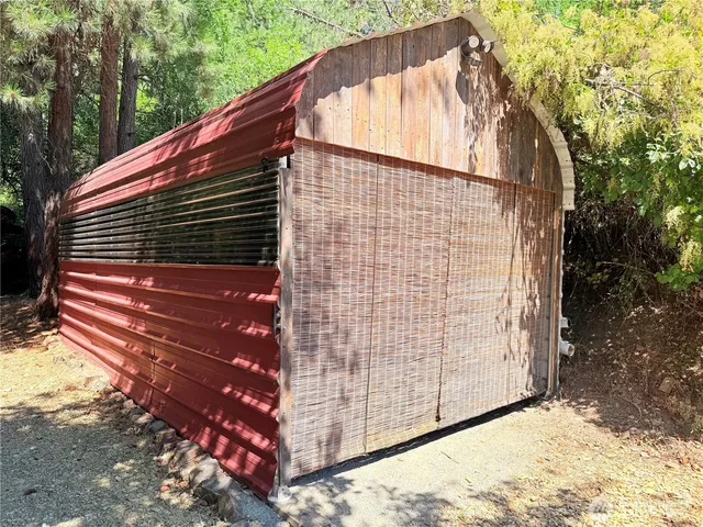 a view of a balcony with two chairs