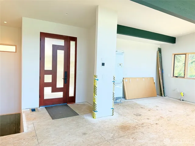 a view of a hallway with a bedroom