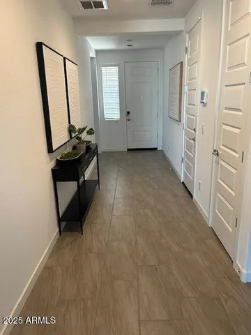 a view of a utility room with closet