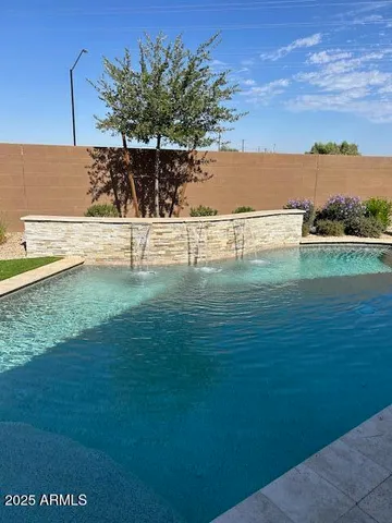 a view of a garden and an ocean