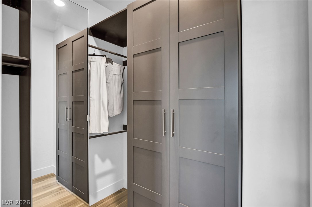 9688 Rankin Rdg Court Las Vegas, NV 89178 - Photo 32 of 53 Ample storage solutions are provided by the well-designed closet system with integrated shelving and hanging space.