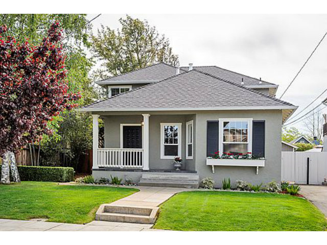 113 Channing Road Burlingame, CA 94010 - Photo 1 of 25 a front view of a house with a garden and yard