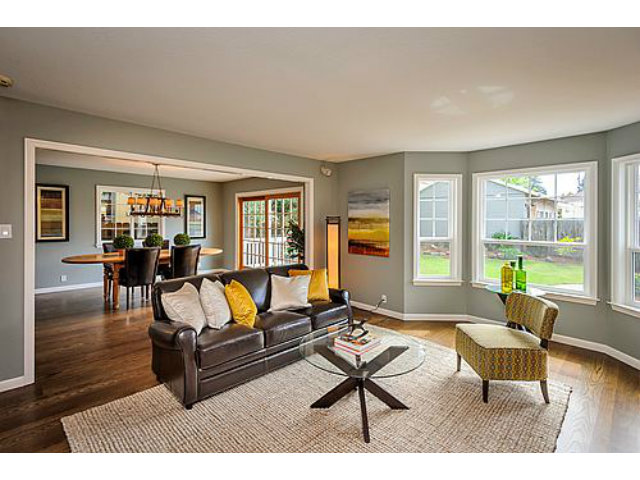 113 Channing Road Burlingame, CA 94010 - Photo 12 of 25 a living room with furniture and a table